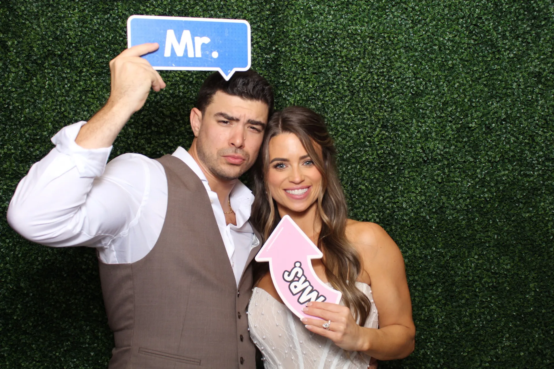 Garden romance wedding portrait with soft floral styling and luxury booth lighting.